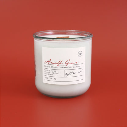Candle with a label on a red background