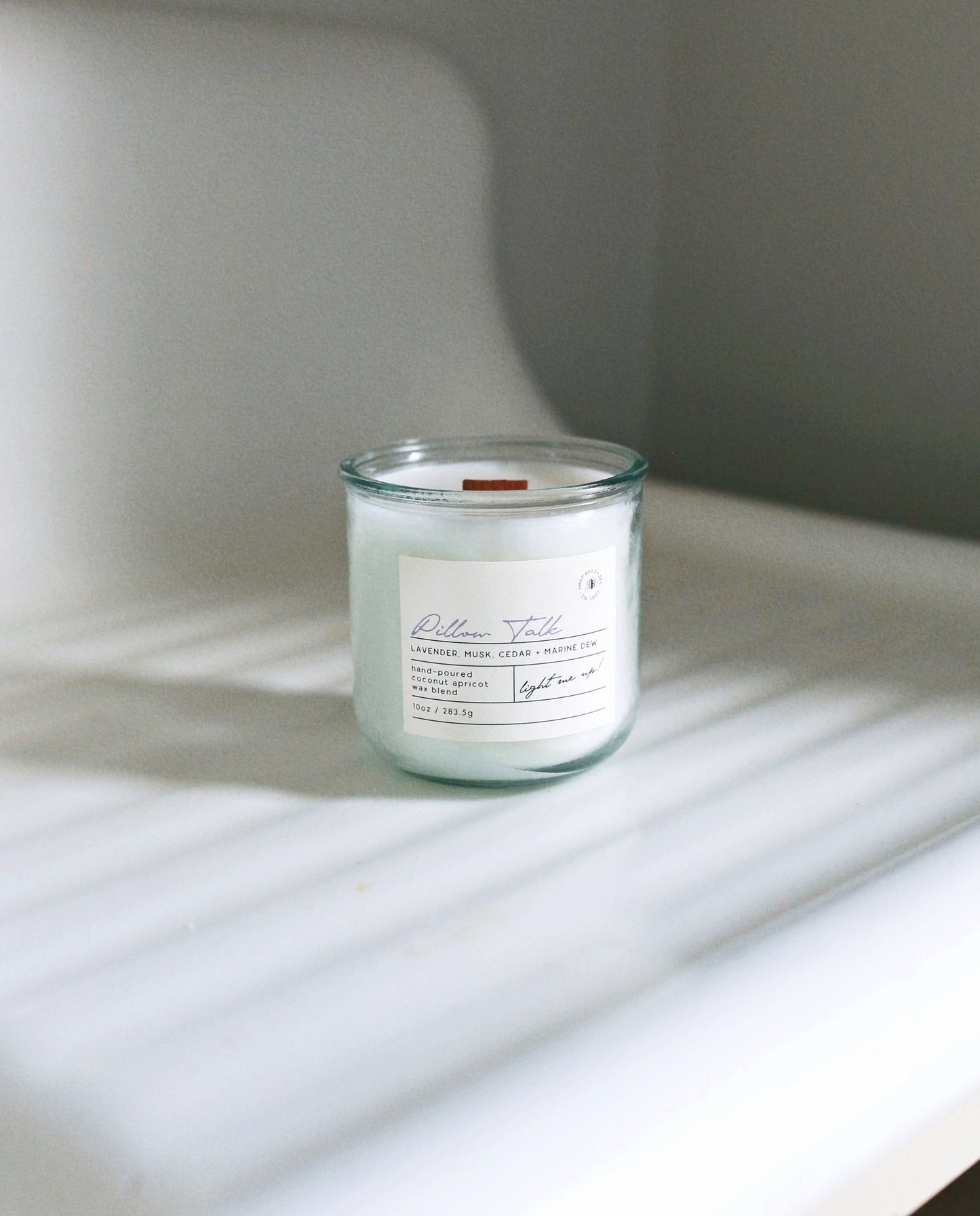 Pillow Talk Classic candle in laundry room